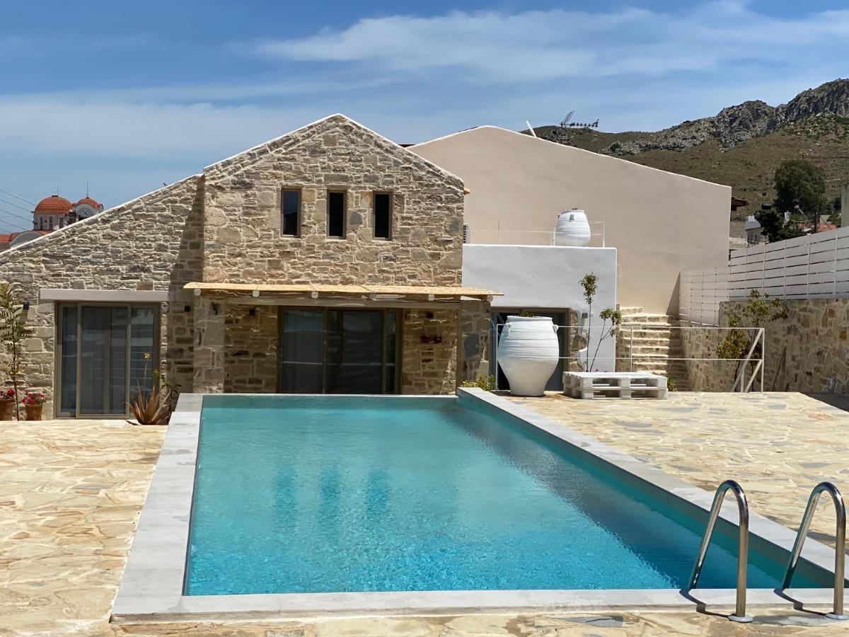 Laini Luxury Suites Pombia Bagian luar foto
